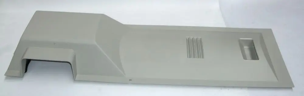 Grau Abdeckung für ein Sperrventil, geeignet für Anwendungen von Daikin, mit einer strukturierten Oberfläche und Aussparungen an der Seite.